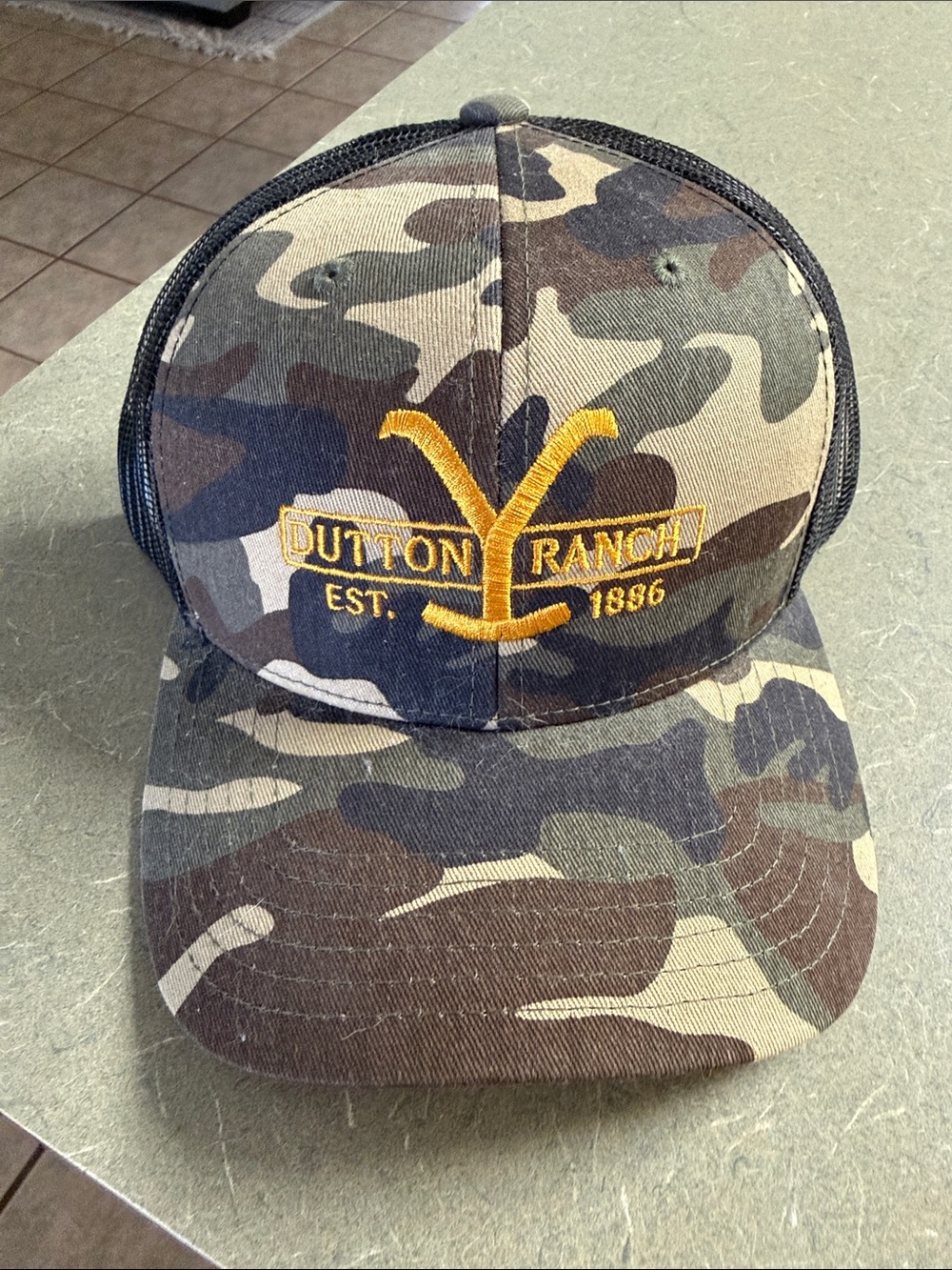 Camouflage Trucker Hat - Camo with Gold Logo